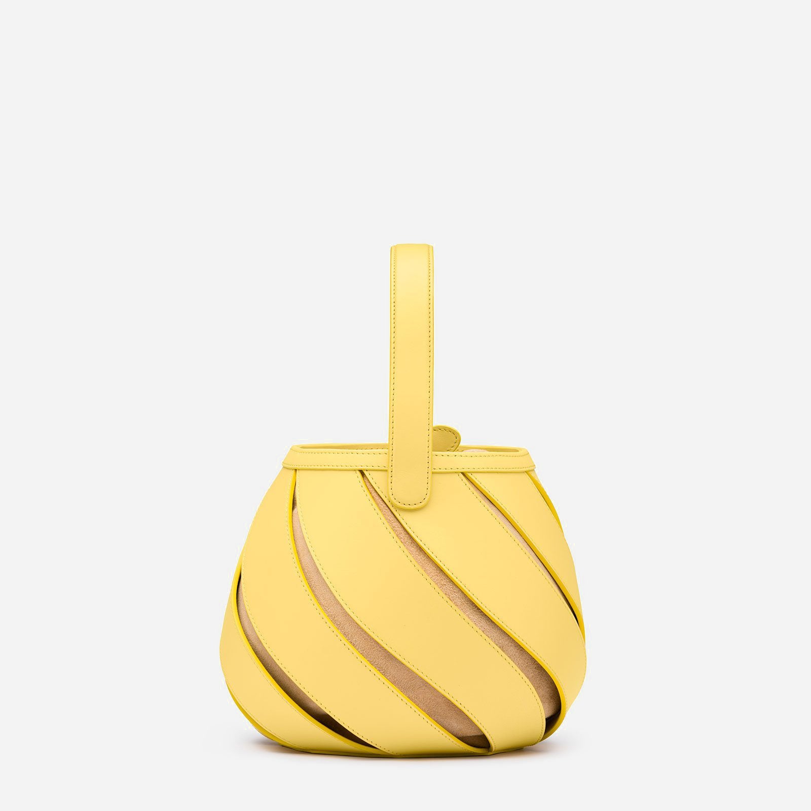Front view of yellow bucket purse with small handle and spiral pattern.